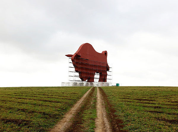 Scheduled maintenance of bison sculpture on M1 Highway